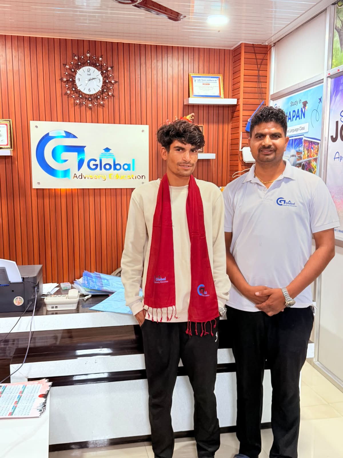 Student felicitated with a khada at the Global Advisory Education office before departing for Japan